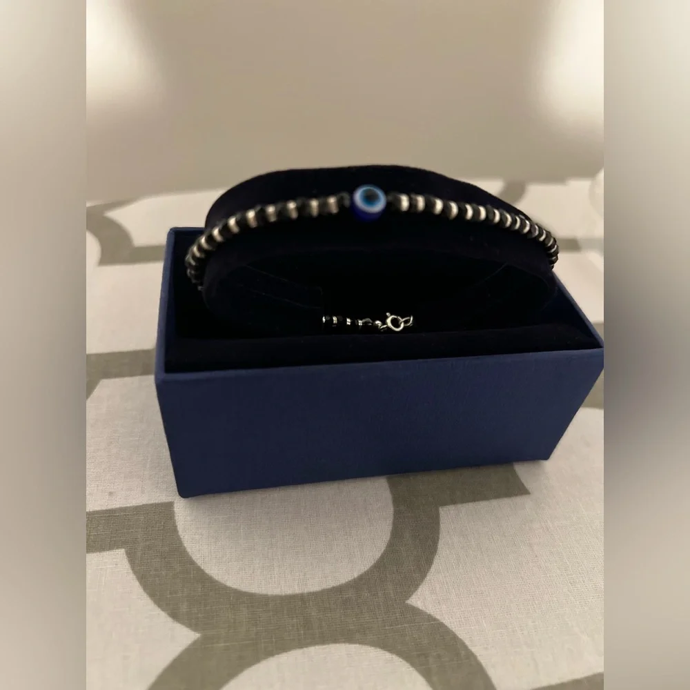 Sterling silver evil eye bracelet with black crystals NWOT